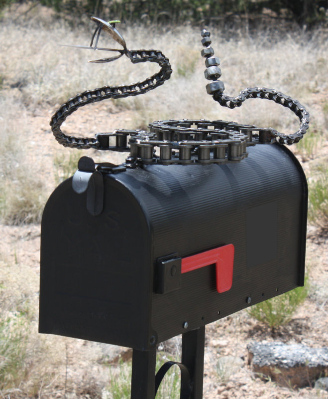 [Rattlesnake on the mailbox.]